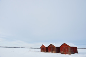 Old Wooden Granaries in Winter