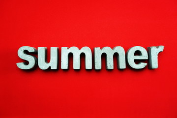 Summer alphabet letters on red background