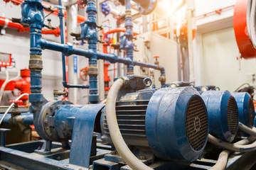 Obraz premium industrial water pump and water pipes.