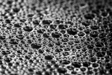Black and White image of water and dish soap bubbles 