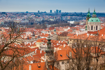 Obraz premium The beautiful Prague city old town seen form the Prague Castle viewpoint in an early spring day