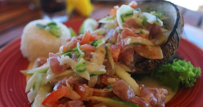 Tahitian local food. Typical raw fish dish called Poisson Cru, aka Ota ika, a Polynesian dish and a National Dish of Tahiti, French Polynesia. High-end restaurant presentation.