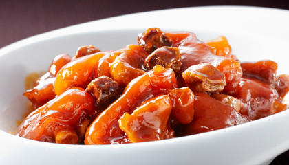 Delicious Chinese food, sweet and sour pork feet with plum

