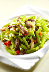Delicious Chinese food with shredded pork and green vegetables


