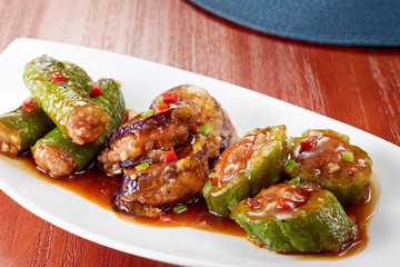 Delicious Chinese food, eggplant, pepper and bitter gourd stuffed with meat

