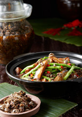 Delicious Chinese cuisine, braised eggplant and beans with crab sauce in clay pot