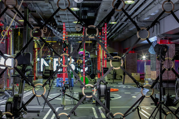 Modern gym interior with equipment. Sport, fitness and health care concept