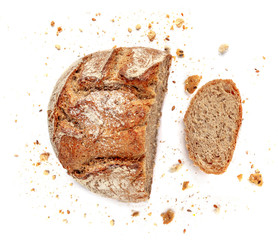 Sliced bread isolated on  white background. Crumbs and fresh Bread slices close up. Bakery, food...