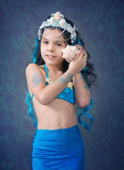 Girl in a mermaid costume