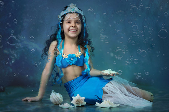 Girl  in a mermaid costume