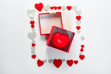 Valentine Gift Box with red hearts on white background. Valentines and 8 March Mother Women ′s Day concept.  Love you. Just for you