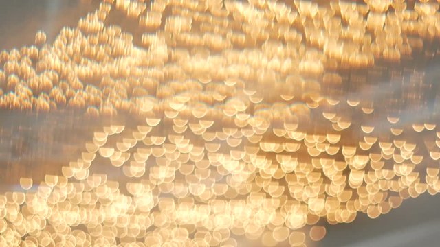 Crystal strass lamp over warm light background luxury interior design