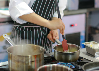 Chef cooking food in the kitchen, Chef preparing food