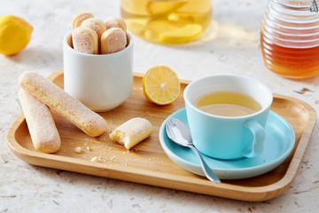 Sponge finger biscuits served with a cup of tea