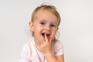 Little baby with finger inside mouth