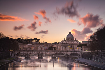 Fototapeta premium Sunset in Rome with the Vatican and the Tiber river. Rome, Lazio, Italy
