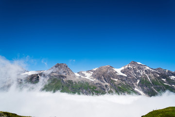 Scenic view of Alpine valley with sea of clouds