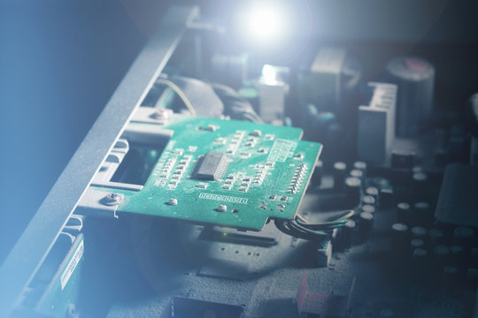 Electronic Board. Small depth of field. Lens flare - Powered by Adobe