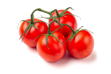 Cherry tomato bunch closeup isolated on white background