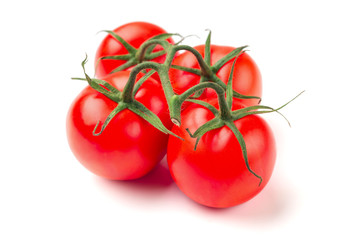 Cherry tomato bunch closeup isolated on white background