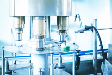 Equipment for the manufacture of caps for plastic bottles.