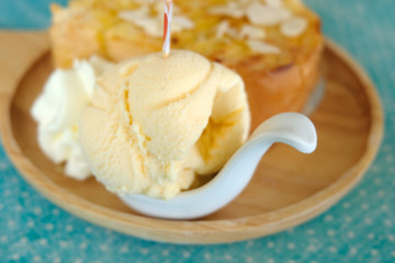 toast bread and ice cream on wooden dish
