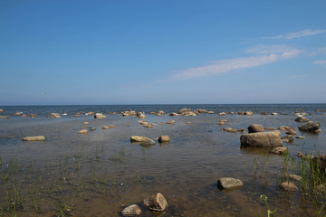 Fototapeta na wymiar Beautiful coastal landscape, Baltic Sea, Latvia. Stones on a beach of the Baltic Sea. Naturally.