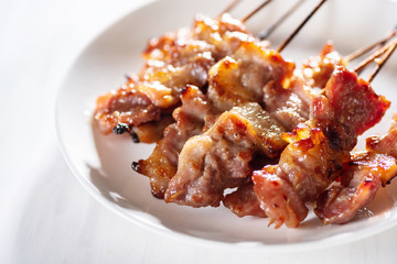 Grilled pork with bamboo stick, poppular street Thai food