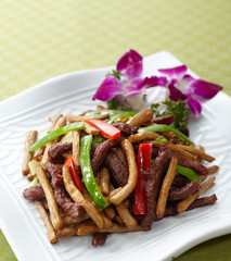 Delicious Chinese food, fried beef with tea tree mushroom