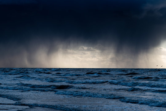 Dark and stormy clouda above Baltic sea.