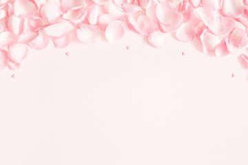 Flowers composition. Rose flower petals on pastel pink background. Valentine's Day, Mother's Day concept. Flat lay, top view, copy space - 244677145