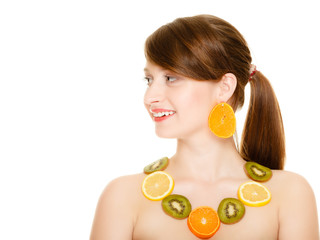 Obraz na płótnie Canvas Diet. Girl with necklace of fresh citrus fruits isolated