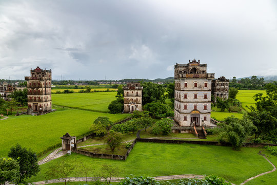 Fototapeta July 2017 – Kaiping, China - Kaiping Diaolou in Zili Village, near Guangzhou. Built by rich overseas Chinese, these family houses are a unique mix of Chinese and western architecture