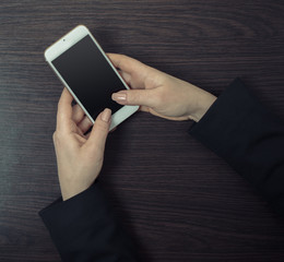 mobile phone in female hands