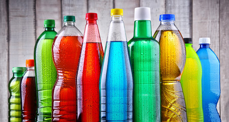 Plastic bottles of assorted carbonated soft drinks