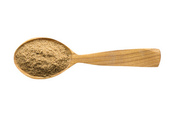 cumin powder in wooden spoon isolated on white background. spice for cooking food, top view.