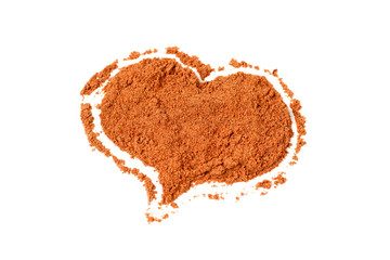 Red ground paprika in the shape of a heart isolated on white background, top view