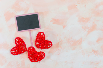 hearts and a plate for the inscription on a pink background