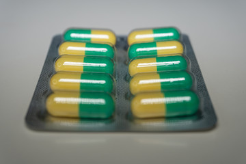 Pills on white background