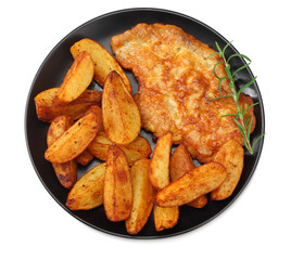 Fried potato wedges with schnitzel on black plate isolated on white background. top view.