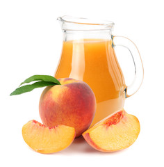 jug of peach juice with peach fruit and slices isolated on white background.