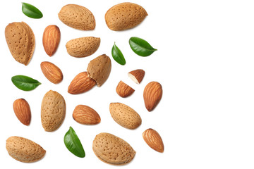 almonds with green leaves isolated on white background. top view.