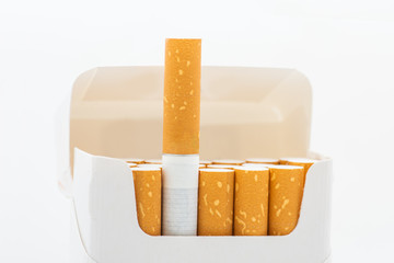 Open pack of cigarettes isolated on white