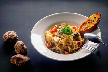 Pasta with mushrooms in a creamy sauce. Fettuccine