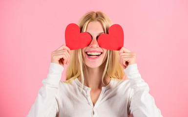 Girl cheerful fall in love. Girl hold heart symbol love and romantic pink background. Love is...