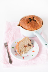 Traditional German Easter Bread, Osterbrot, made of Brioche yeast dough with raisins, eggs, milk, flour, yeast, sugar and butter baked in small saucepan served for Easter Sunday breakfast or brunch