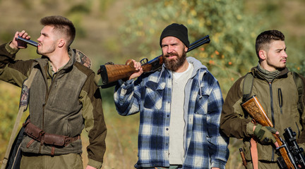 Poacher partner in crime. Poaching concept. Activity for brutal men. Hunters poachers looking for...