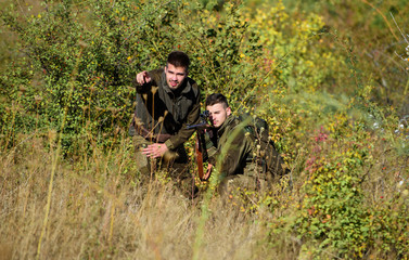 Army forces. Camouflage. Military uniform fashion. Friendship of men hunters. Hunting skills and...