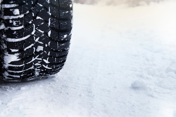 Closeup of car tires in winter 