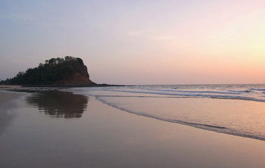 Fototapeta na wymiar Kashid beach located 30 km from Alibaug famous for its beautiful clear blue water, white color sand and lovely streams, Maharashtra, India.